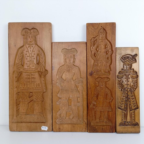 1408 - A carved treen gingerbread mould, and three others (4)