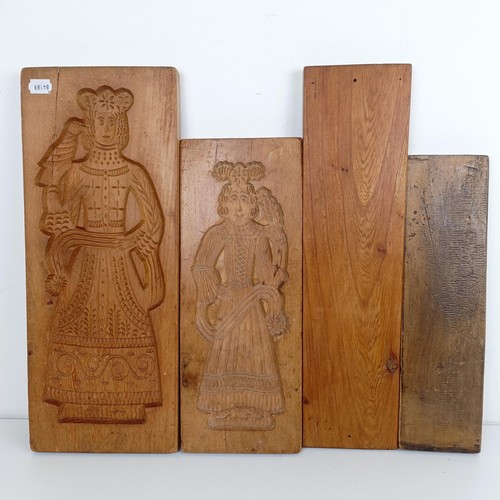 1408 - A carved treen gingerbread mould, and three others (4)