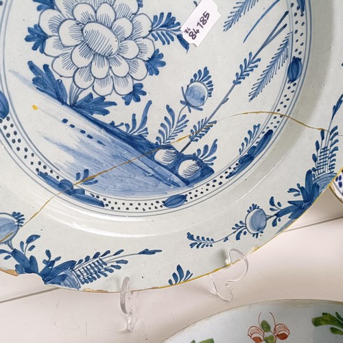 1409 - A Delft blue and white plate, 35 cm diameter, and assorted other Delft plates (12)