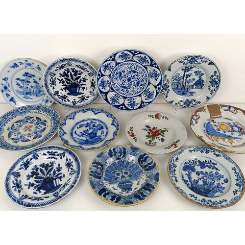 1411 - A Delft blue and white plate, 23 cm wide, and assorted other Delft plates (11)