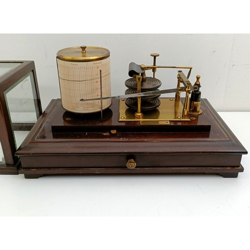 1496 - A barograph, by Reynolds & Bransom Ltd, of Leeds, in a mahogany case, 37 cm wide