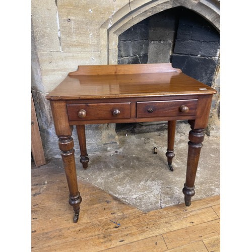 1634 - A mahogany side table, 75 cm wide, an oak side table, 104 cm wide, and a pair of hall chairs (4)