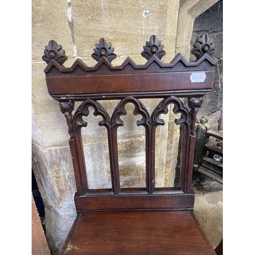 1631 - A pair of 19th century mahogany hall chairs (2)