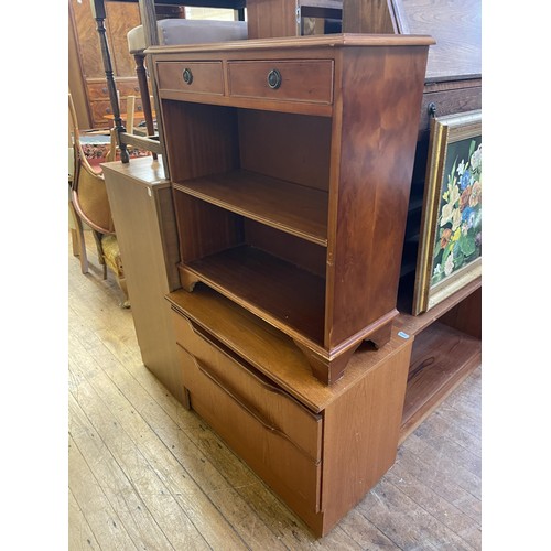 1633 - A yew wood bookcase, 74 cm wide, a teak chest, three chests of drawers, a stool, a mirror, an oak si... 