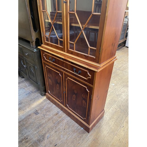 1633 - A yew wood bookcase, 74 cm wide, a teak chest, three chests of drawers, a stool, a mirror, an oak si... 