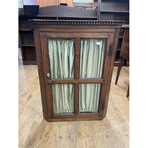 1642 - A mahogany sideboard, 140 cm wide, a corner cabinet, a folding table, a fire screen, an oak drop lea... 