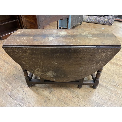 1642 - A mahogany sideboard, 140 cm wide, a corner cabinet, a folding table, a fire screen, an oak drop lea... 