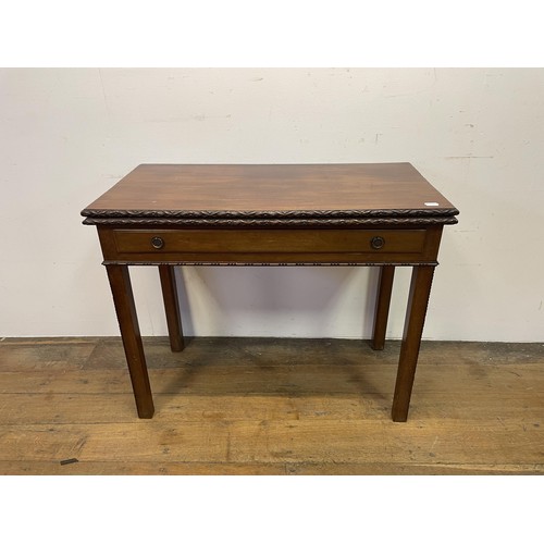 1626 - A mahogany folding card table, 91 cm wide