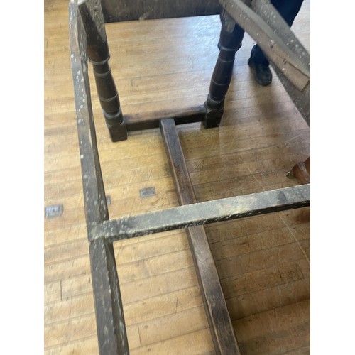 1652 - An 18th century style oak refectory table, the plank top above a carved frieze, 202 x 76 cm