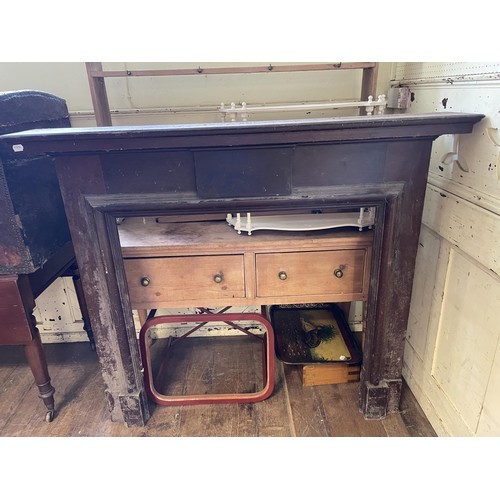 1555 - A pine dresser, 131 cm wide, a wall shelf, an easel, a fire surround, and a tray topped table (6)