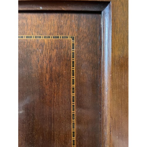 1668 - A mahogany triple wardrobe, 184 cm wide