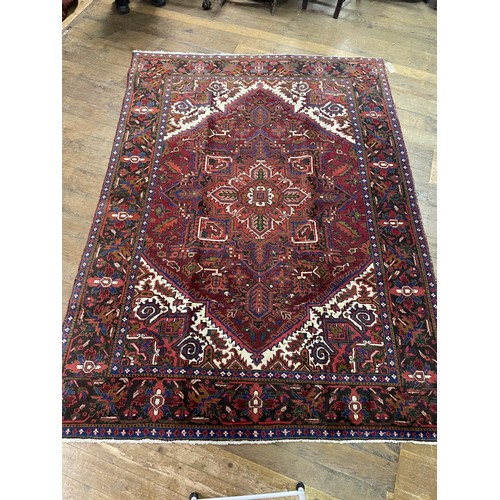 1592 - An Heriz carpet, 294 x 210 cm