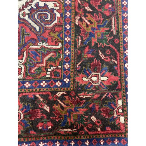 1592 - An Heriz carpet, 294 x 210 cm