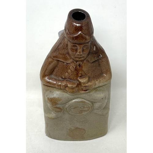 1461 - A 19th century stoneware novelty bottle, 8.5 cm high