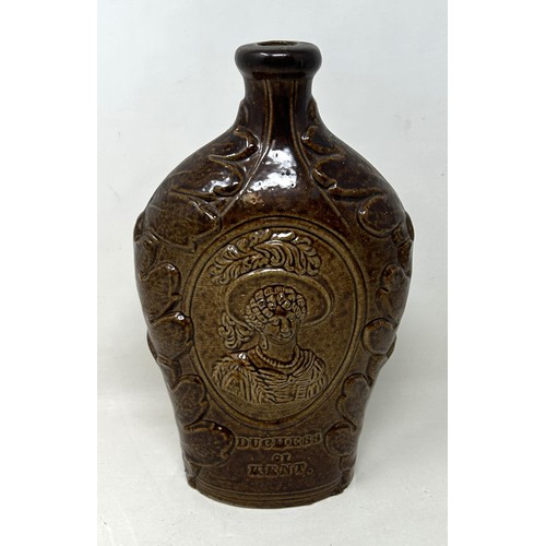 1462 - A 19th century brown glazed bottle, decorated portrait of The Duchess of Kent and Queen Victoria, 21... 