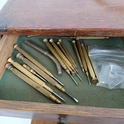 1503 - A group of assorted watchmakers and other tools, in a cabinet, and others loose (box)