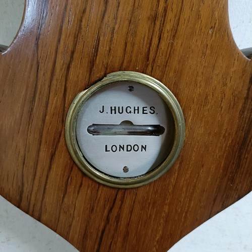 1524 - A Victorian wheel barometer, by J Hughes, London, with silvered dials, in a rosewood case, 114 cm hi... 