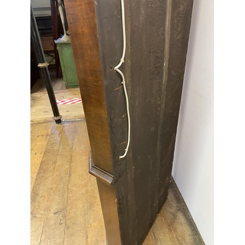 1565 - A walnut floor standing corner cupboard, 100 cm wide