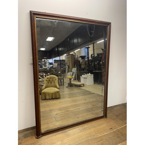 1563 - A large mahogany framed shop/overmantle mirror, 180 x 133 cm