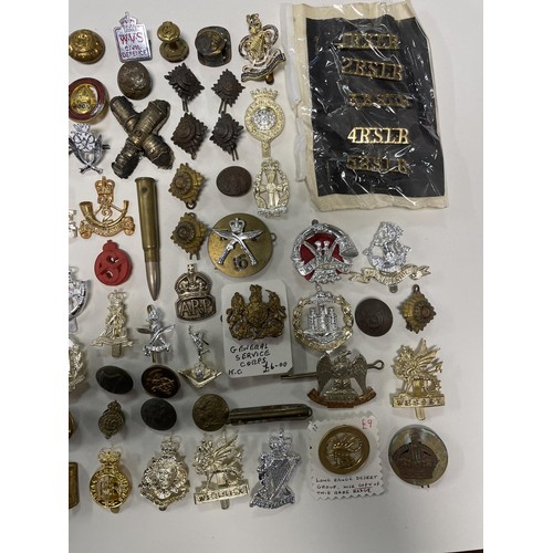 980A - Assorted stay-brite military badges, and other items