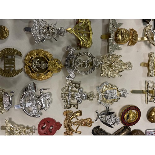 980A - Assorted stay-brite military badges, and other items