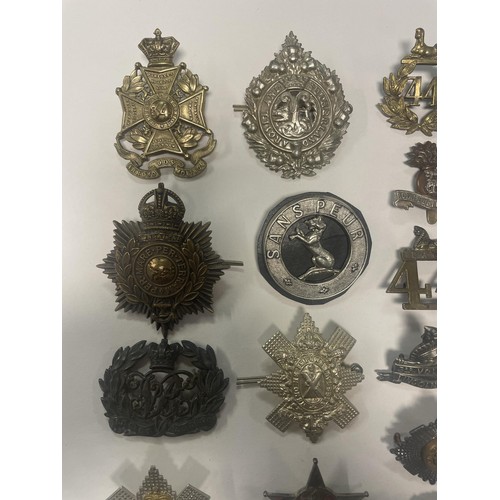 991A - Assorted Victorian and later military badges, and other items