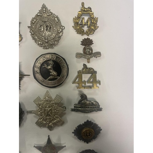 991A - Assorted Victorian and later military badges, and other items