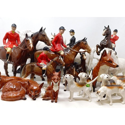 1458 - A Beswick huntsman, another, assorted Beswick horses, Beswick hounds and other Beswick items (qty)