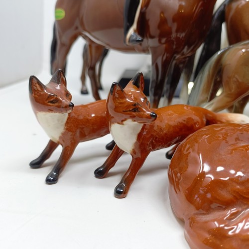 1458 - A Beswick huntsman, another, assorted Beswick horses, Beswick hounds and other Beswick items (qty)