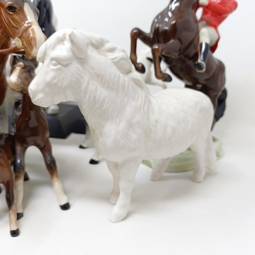 1458 - A Beswick huntsman, another, assorted Beswick horses, Beswick hounds and other Beswick items (qty)