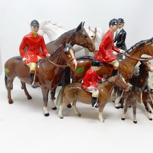 1458 - A Beswick huntsman, another, assorted Beswick horses, Beswick hounds and other Beswick items (qty)