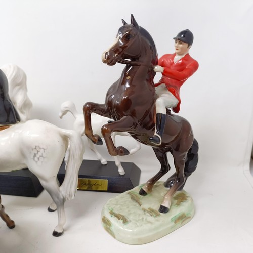 1458 - A Beswick huntsman, another, assorted Beswick horses, Beswick hounds and other Beswick items (qty)