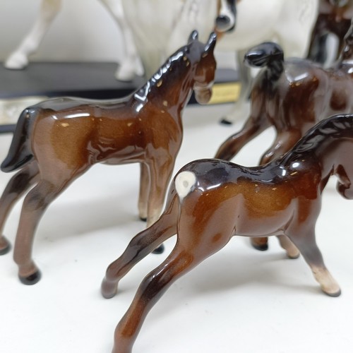 1458 - A Beswick huntsman, another, assorted Beswick horses, Beswick hounds and other Beswick items (qty)