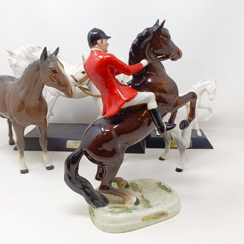 1458 - A Beswick huntsman, another, assorted Beswick horses, Beswick hounds and other Beswick items (qty)