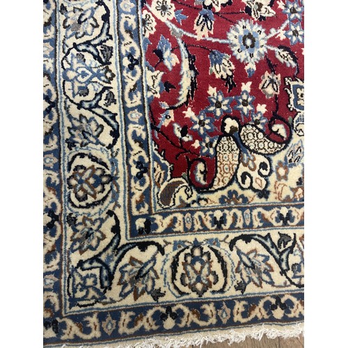 1596 - A Persian Esterhon rug, 212 x 128 cm