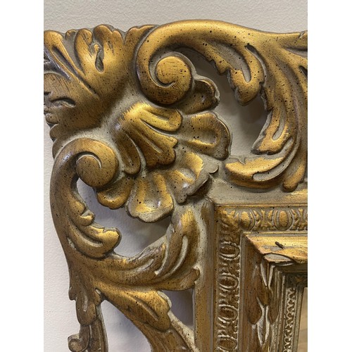 1674 - A gilt wall mirror, 110 x 90 cm