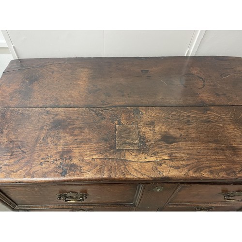 1627 - An oak chest, having three drawers, 105 cm wide