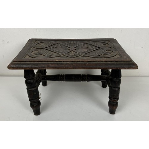 1373 - A 19th century oak table top chest, having a lift up top above two drawers, 60.5 cm wide, a carved s... 