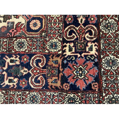 1689 - A Persian Qum rug, 190 x 130 cm