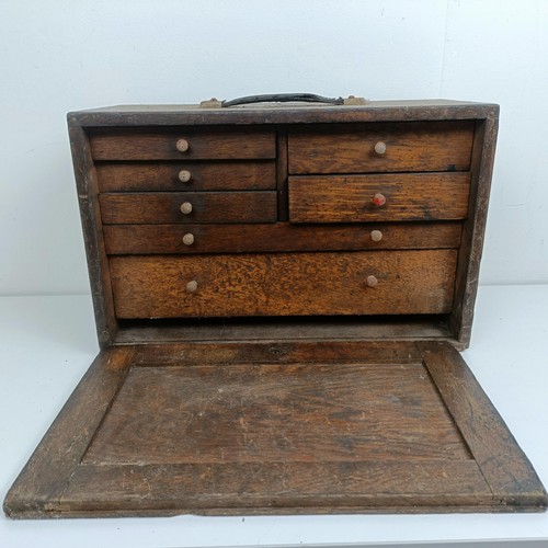 1905 - Assorted clock makers and other tools, in a cabinet 44 cm wide