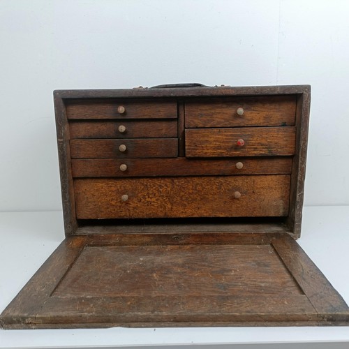 1905 - Assorted clock makers and other tools, in a cabinet 44 cm wide