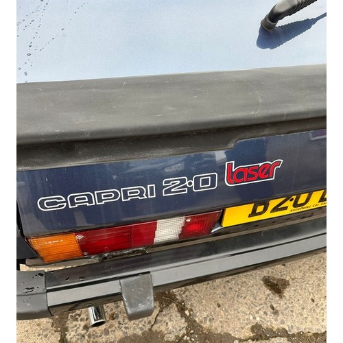 43 - 1985 Ford Capri 2.0 Laser Registration number B20 LSR Blue over grey with a black interior Purchased... 