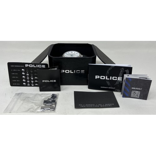 2 - A gentleman's stainless steel Police 10 ATM wristwatch, boxed, with warranty booklet, instruction ma... 