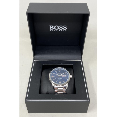 5 - A gentleman's stainless steel Hugo Boss Pilot Edition wristwatch, boxed, with receipt, warranty book... 