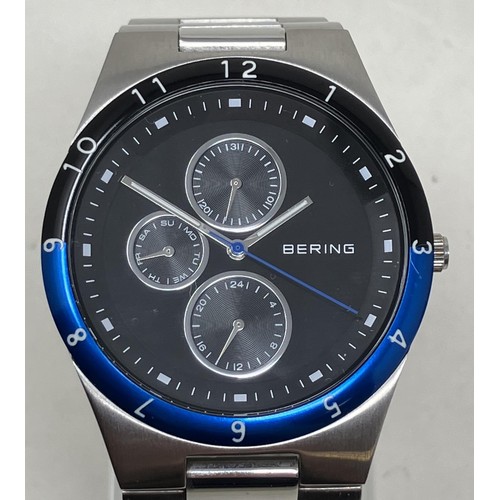 11 - A gentleman's stainless steel Bering wristwatch 32339-702, in a glass case, with guarantee, instruct... 
