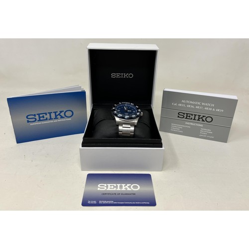 18 - A gentleman's stainless steel Seiko 5 Sports Automatic 21 jewels 100m wristwatch, boxed, with instru... 