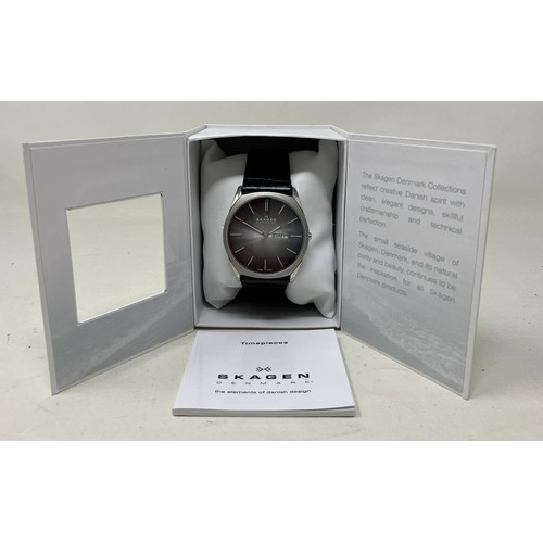 27 - A gentleman's titanium Skagen 233XLTTMO wristwatch, on a steel mesh strap, boxed, with instruction a... 