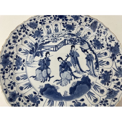 1502 - A Chinese porcelain dish, of lobed circular form, decorated lady musicians, other figures and foliag... 