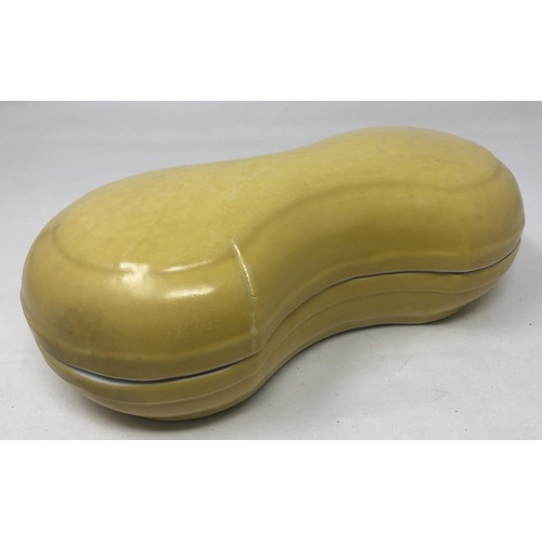 1509 - A Chinese yellow glazed shaped box and cover, character mark to base, 26 cm wide