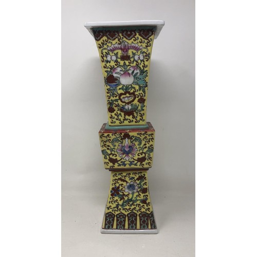 1524 - A Chinese yellow ground vase, with a four character mark, 37 cm high